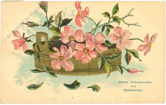 namenstag: holzgefäß mit blumen