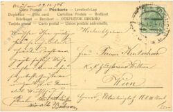 weihnachten: zweig mit goldener weihnachtskugel