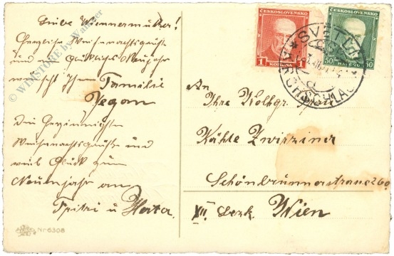 weihnachten: verschneites haus mit reh