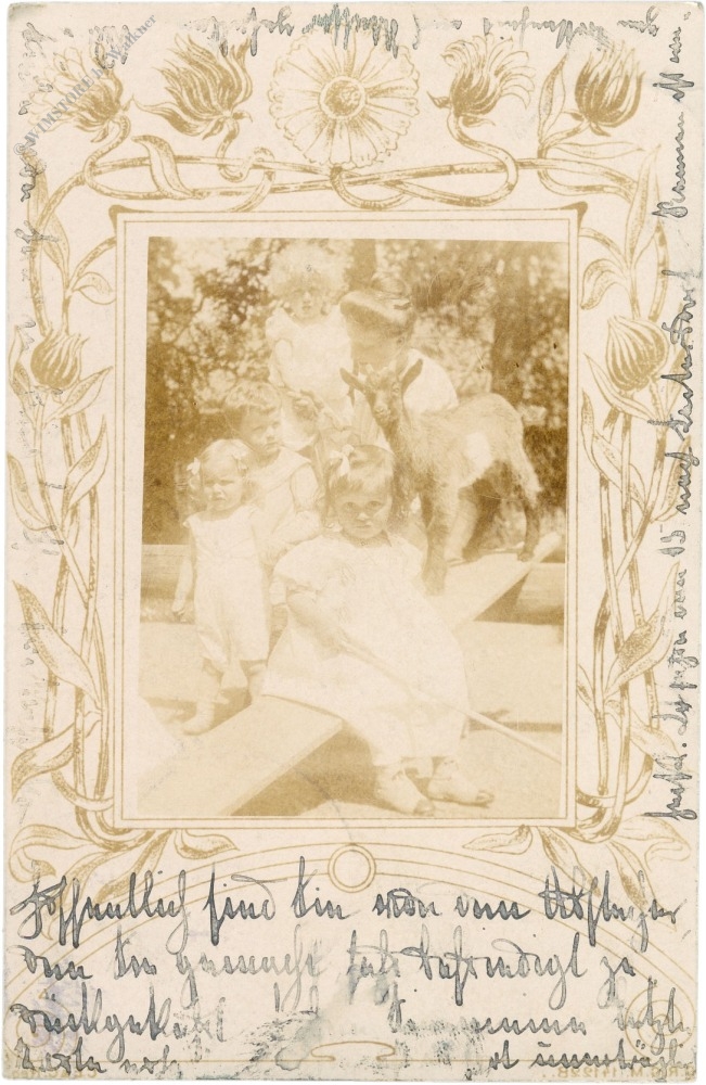 kinder mit einer ziege