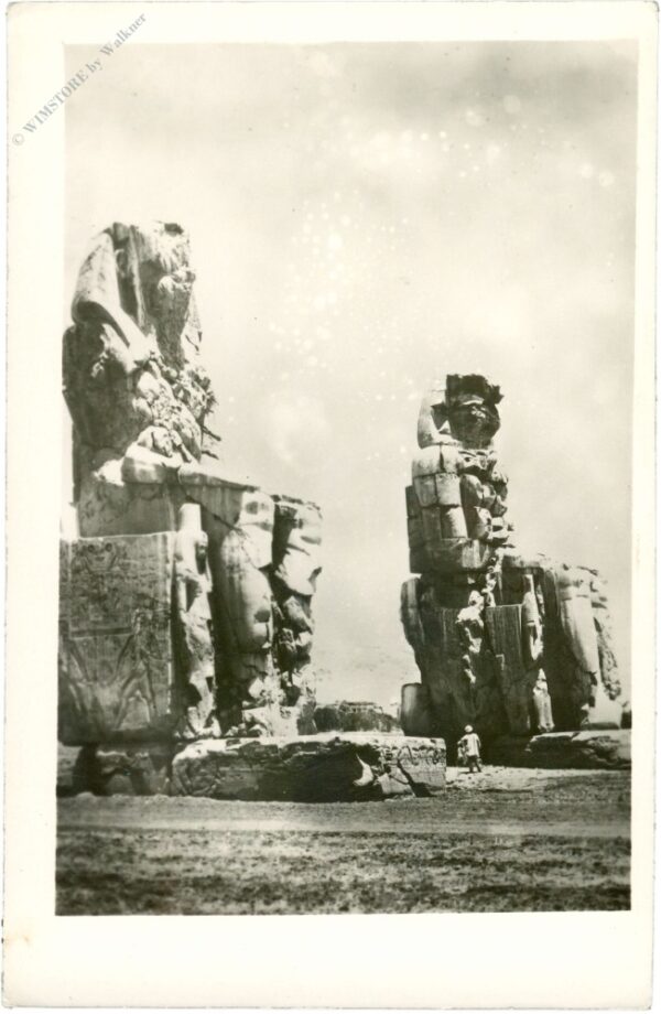 theben, the famous clossi of memnon representing the kind amenhotep iii