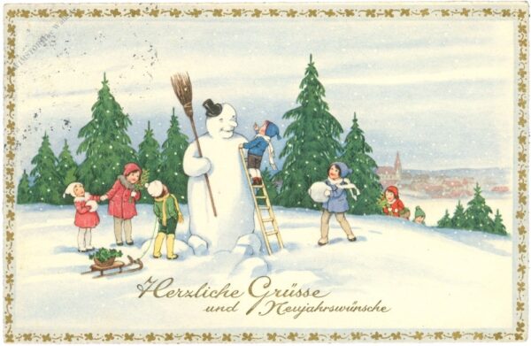neujahr, kinder bauen einen schneemann