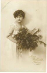 weihnachten, junge frau mit gesteck
