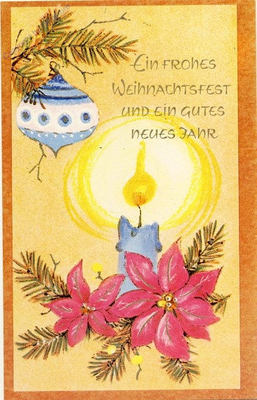 Kerze und Kugel auf Zweig