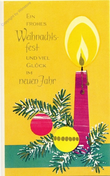 Kerze und Kugeln auf Zweig