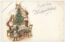 Kinder schmücken Christbaum