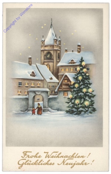 Verschneiter Dorfeingang mit Christbaum