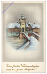 Verschneite Brücke zum Dorf