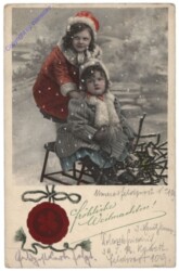 Zwei Mädchen mit Schlitten