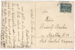 Kalenderblatt mit eingeschneitem Haus und Zweigen