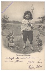 Mädchen mit Hasen auf Wiese