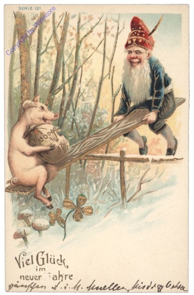 Zwerg mit Ferkel auf Wippe