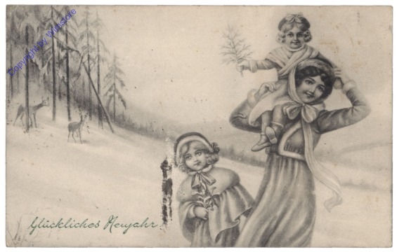 Mutter mit Kindern im Schnee