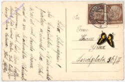 Christbaumast mit Kerze und Glocke