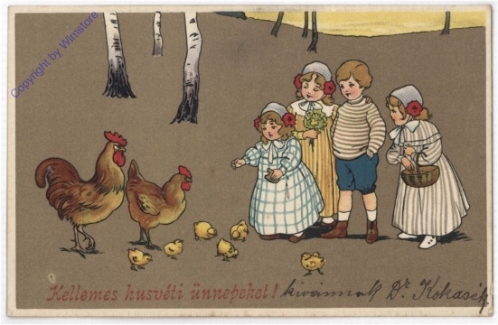 Kinder füttern die Hühner