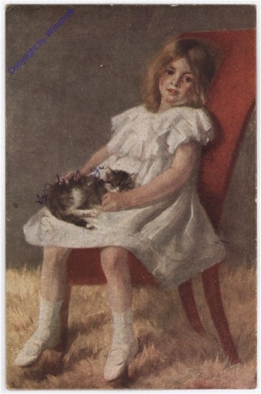 Mädchen mit Katze am Stuhl