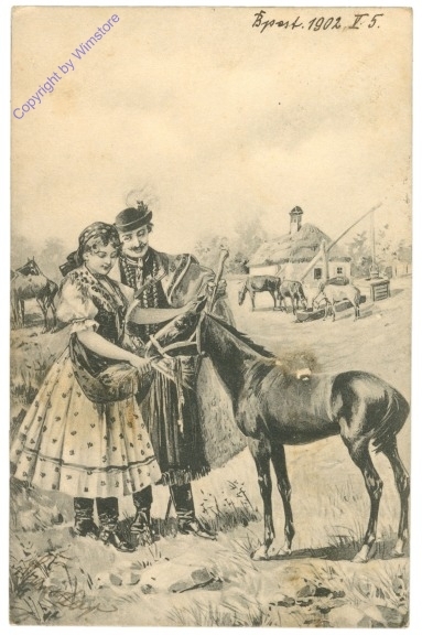 Pärchen in Tracht mit Fohlen