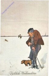 Mann mit Hund im Schnee