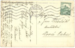 Zweig mit Kerze und Weihnachtskugel