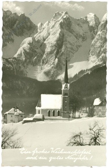 Verschneites Dorf