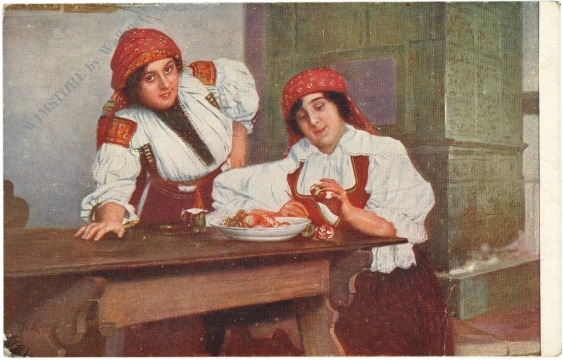 ostern zwei frauen am tisch bemalen ostereier