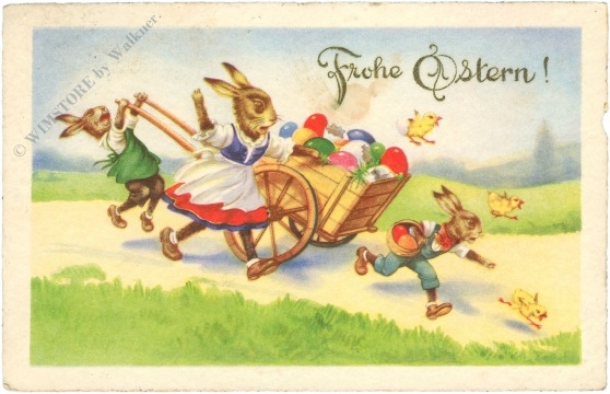 ostern hasenfamilie mit einem karren voller eier